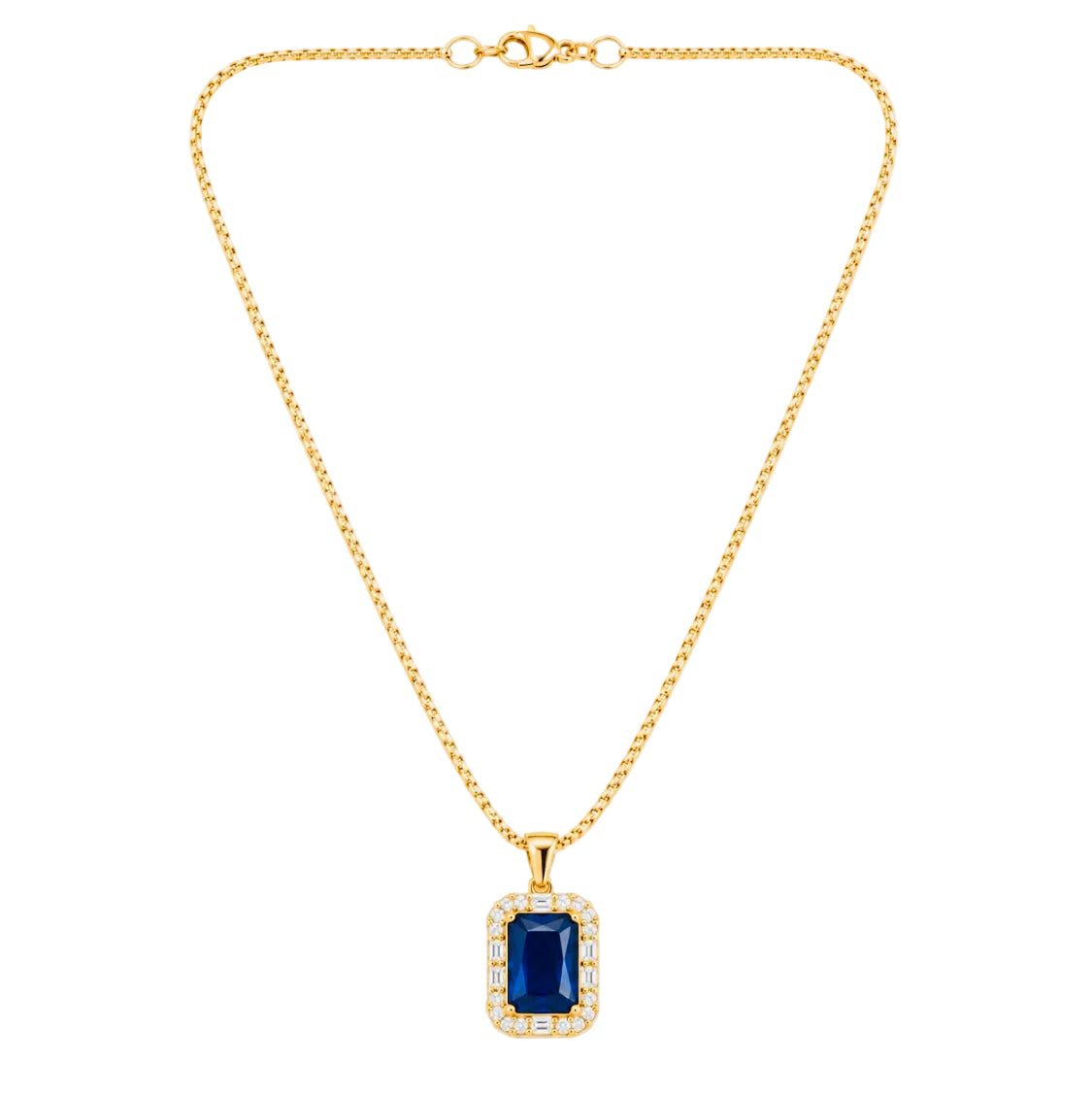 A gold chain necklace with a rectangular halo pendant featuring a deep blue emerald-cut center stone surrounded by small clear stones, shown on a light gray background.